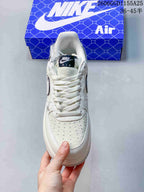 Top view of the sneaker showing its laces, tongue label, and perforated toe panel.