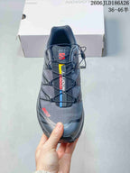 Top view of the gray shoe showing the quick-lace closure and colored accents