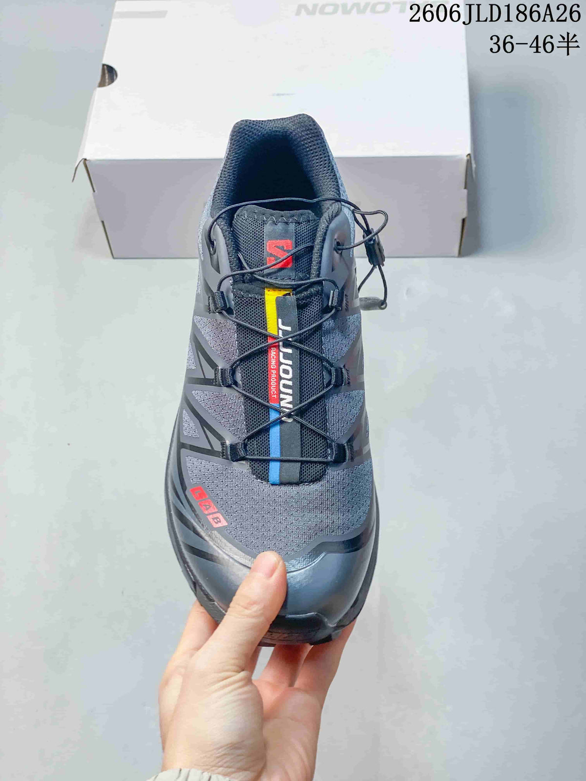Top view of the gray shoe showing the quick-lace closure and colored accents