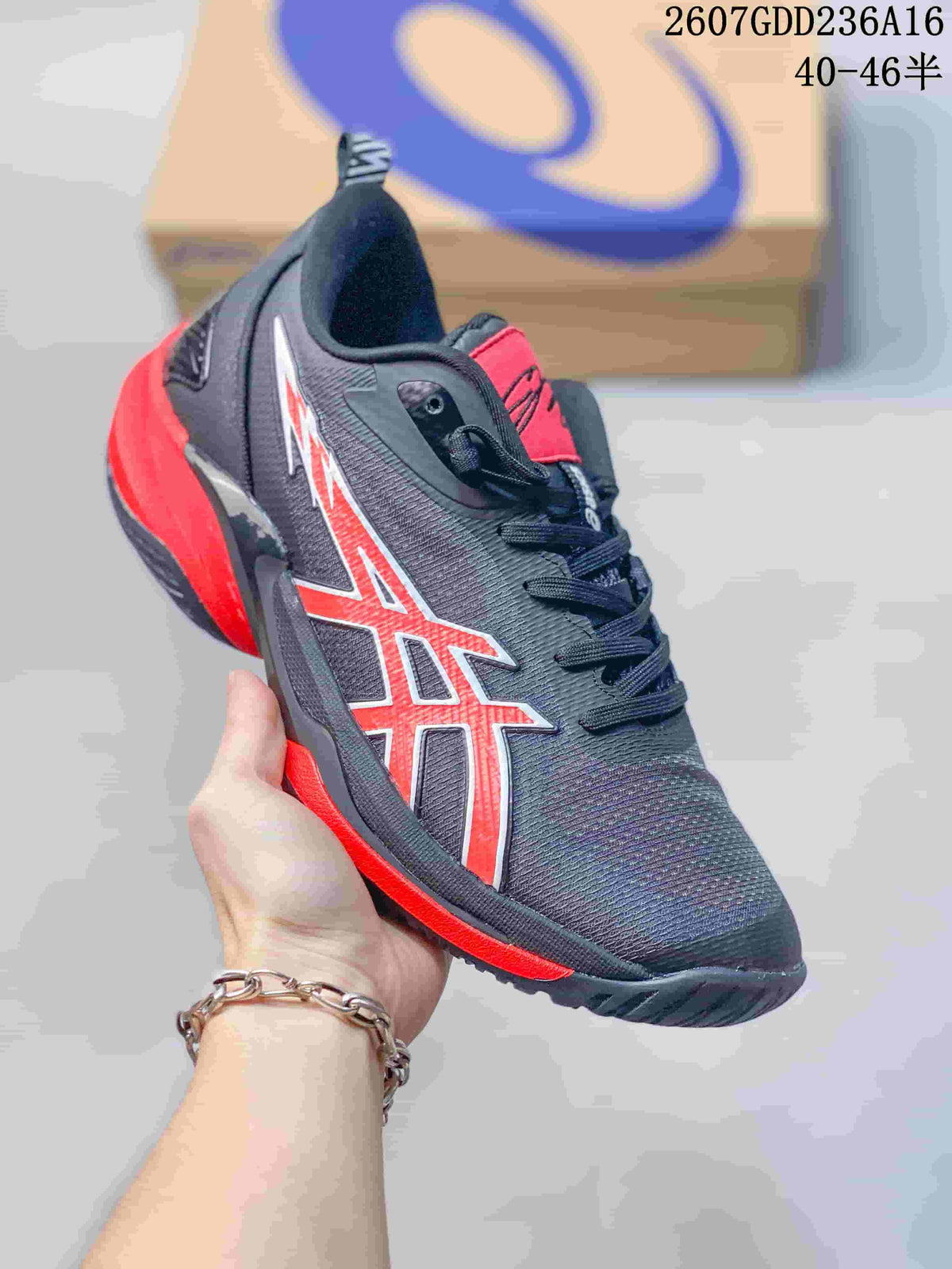 Side view of a black ASICS basketball shoe showing red side branding, red midsole accents and a textured upper.