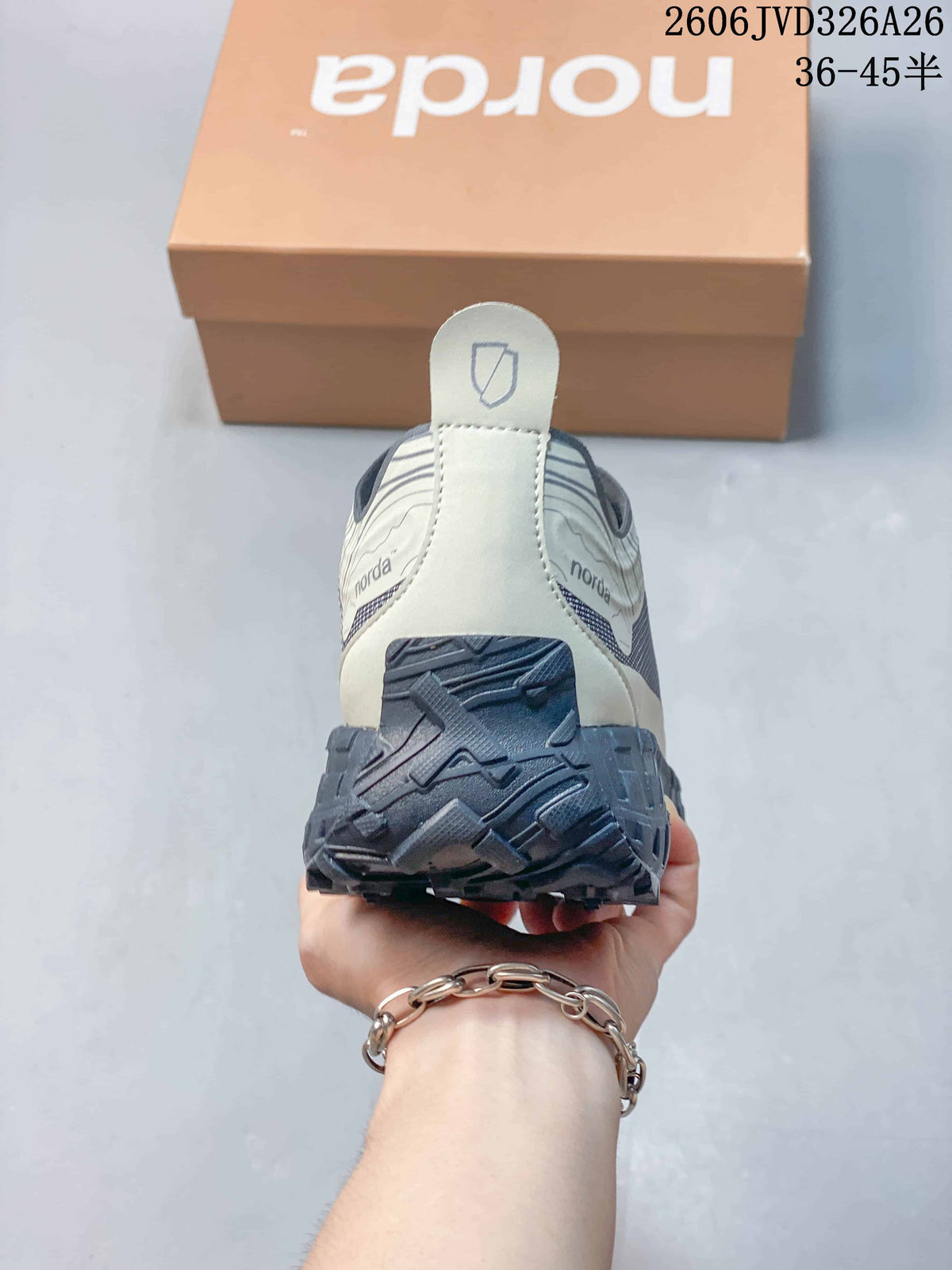Rear view showing the heel structure and rugged outsole.