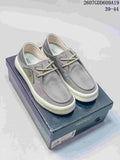 Pair of gray ECCO lace-up sneakers displayed on a branded shoe box; product code 2607GDD609A19 and size range 39–44 are visible.
