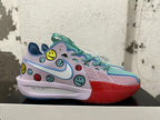 Side view of a Nike basketball shoe with multicolor smiley graphics and the phrase Ready, Set, Go.