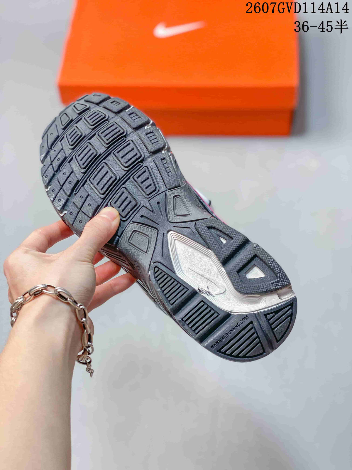 Close-up of the black textured outsole showing the sneaker tread pattern.