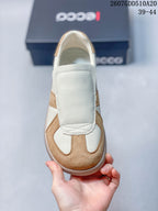 Top view showing the rounded toe and broad cream overlay panel.