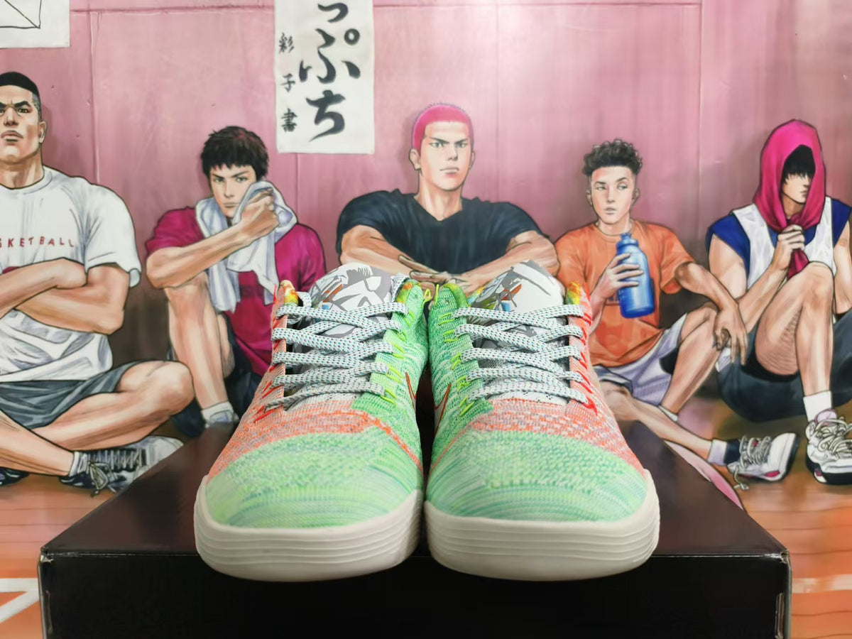 Front view of multicolor Nike basketball shoes with gray laces and white soles.